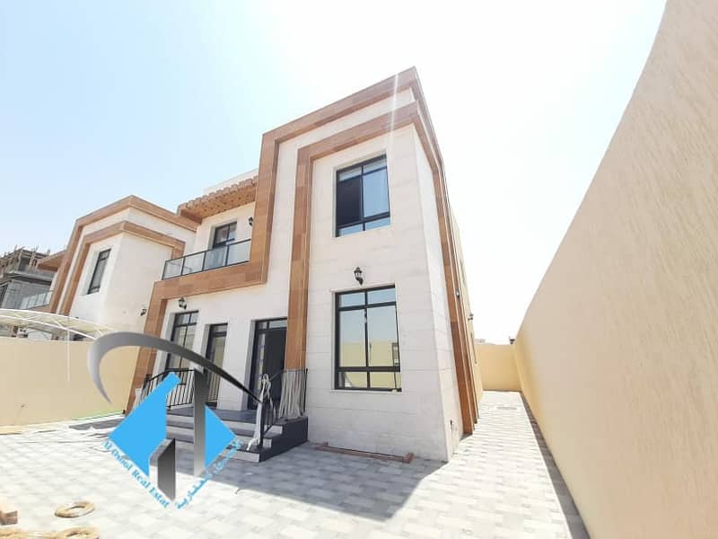 For sale a new villa, the first inhabitant, without down payment, in Ajman, Al Zahia, on an asphalt street, large area, super deluxe finishing, central air conditioning