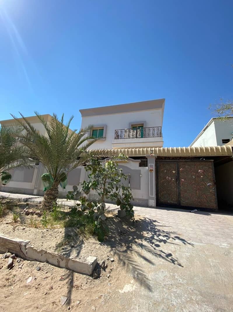 Two-storey villa for rent in Ajman, Al Rawda, with two kitchens, only 68,00