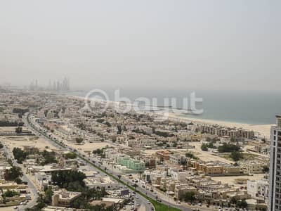 FOR RENT: 2BHK +LAUNDRY ROOM+SEA AND OPEN VIEW IN AJMAN ONE TOWERS ACCESS TO EMIRATES ROAD OF  DUBAI