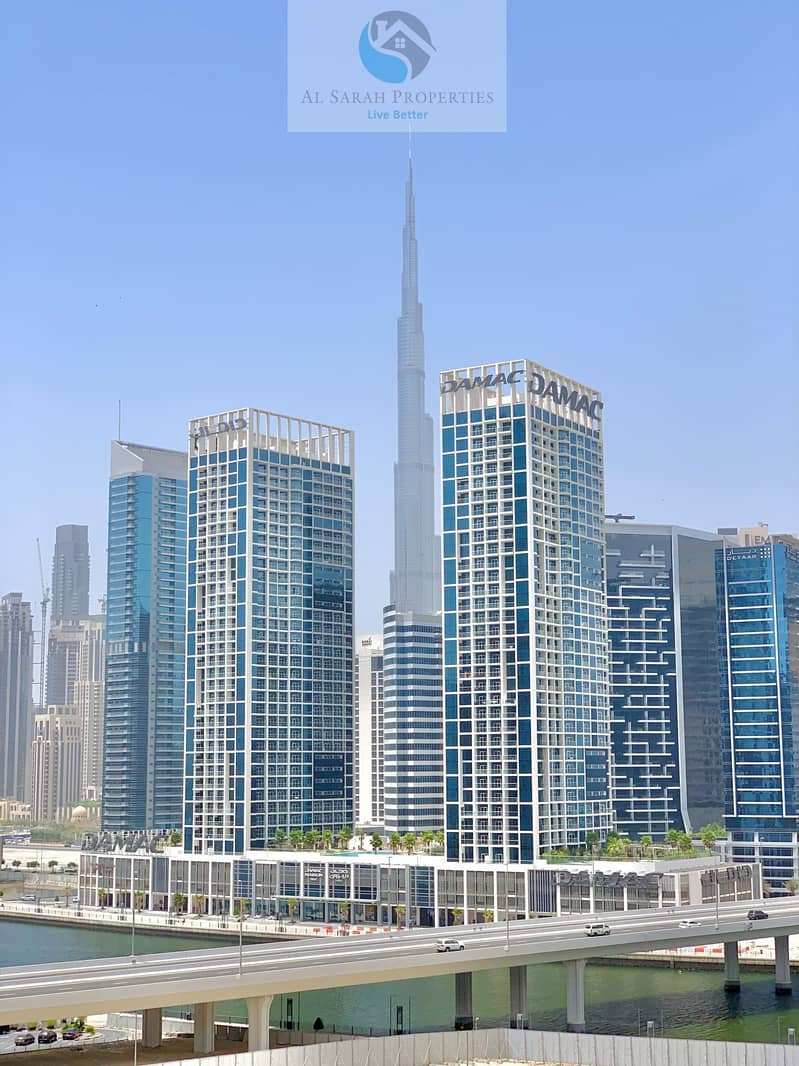 Burj Khalifa and Canal view Spacious Studio Apartment With Balcony