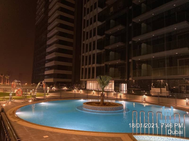 6 move in NOW in Jumeira village circle bloom towers one bedroom two bedroom just pay 25% and take the key . 5 years post.