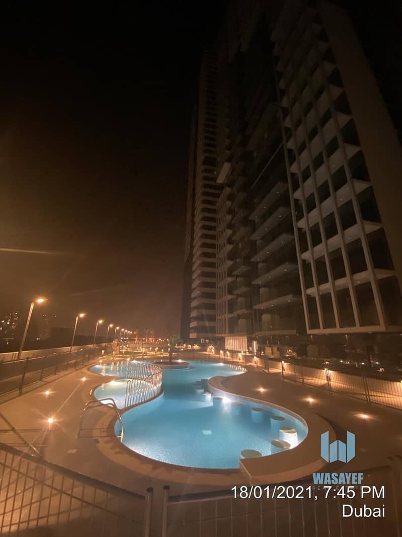 10 move in NOW in Jumeira village circle bloom towers one bedroom two bedroom just pay 25% and take the key . 5 years post.