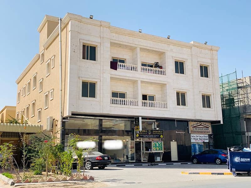 بناية تشطيب سوبر ديلوكس للبيع في منطقة المويهات بإمارة عجمان علي الشارع العام