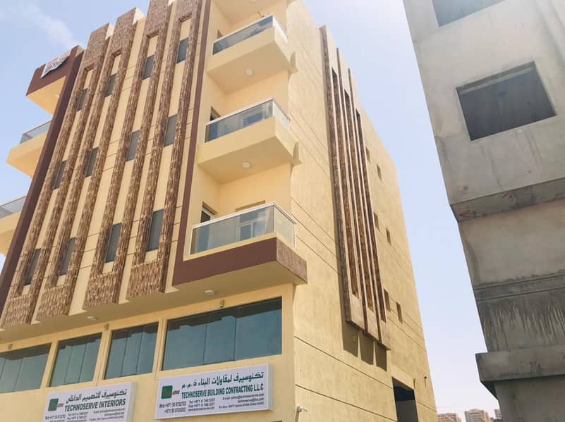 For sale, a building in Ajman, in a very distinctive location, in a high-rise residential, commercial, new, first inhabitant, freehold, for all nationalities