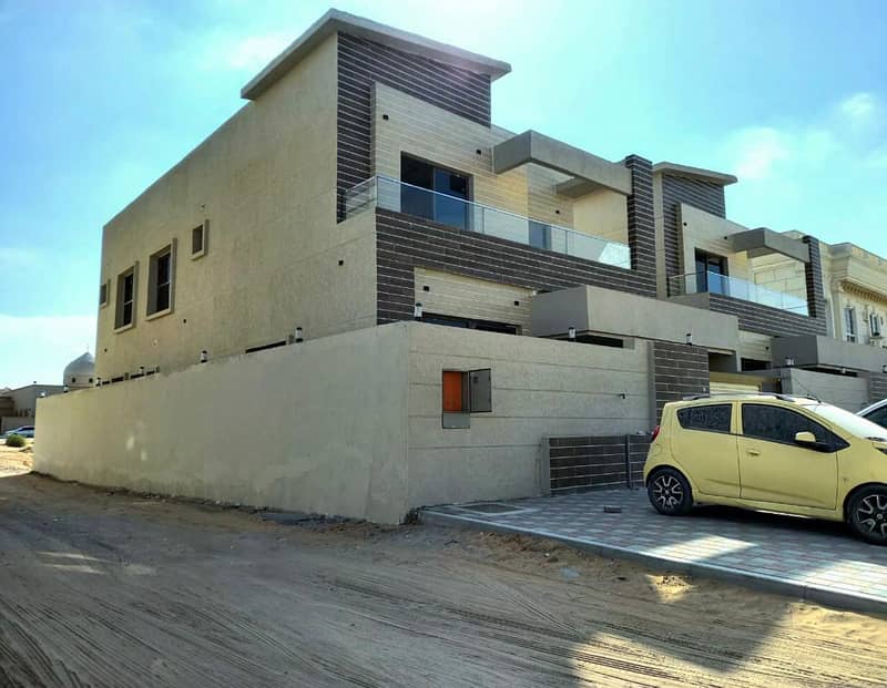 BRAND NEWeuropean  VILLA FOR SALE IN AJMAN ALMOWAIHAT 5 BEDROOM MAJLIS HALL KITCHEN WITH CAR PARKING VERY SPECIAL LOCATION