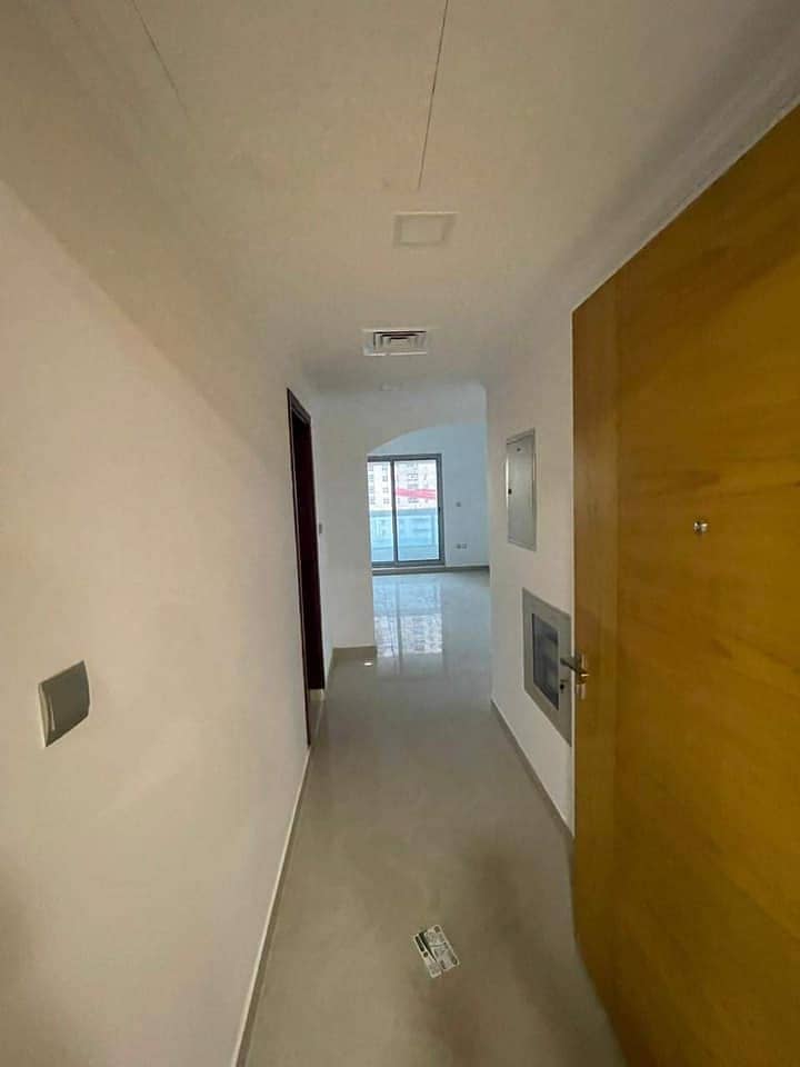 For rent in Ajman, an apartment, one room and a hall, the first inhabitant, a very privileged location close to the Corniche