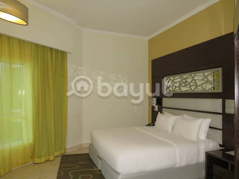 شقة فندقية في فندق فينتاج جراند،مدينة دبي للإنتاج 1 غرفة 90000 درهم - 4697850