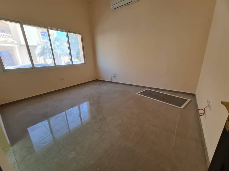 9 Spacious flat 2 bedroom + hall for rent in Shakhbout city good location New Villa