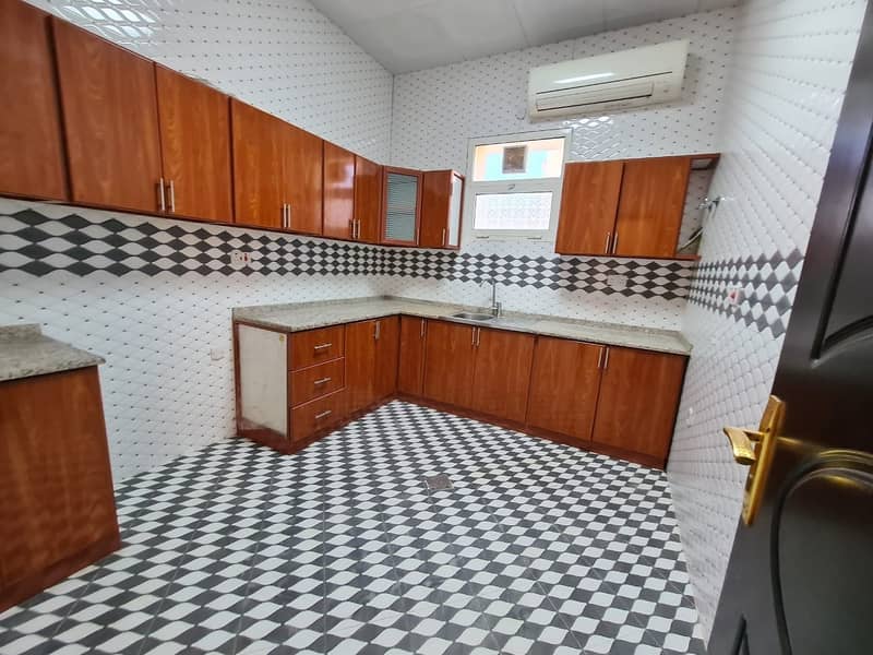 11 Spacious flat 2 bedroom + hall for rent in Shakhbout city good location New Villa