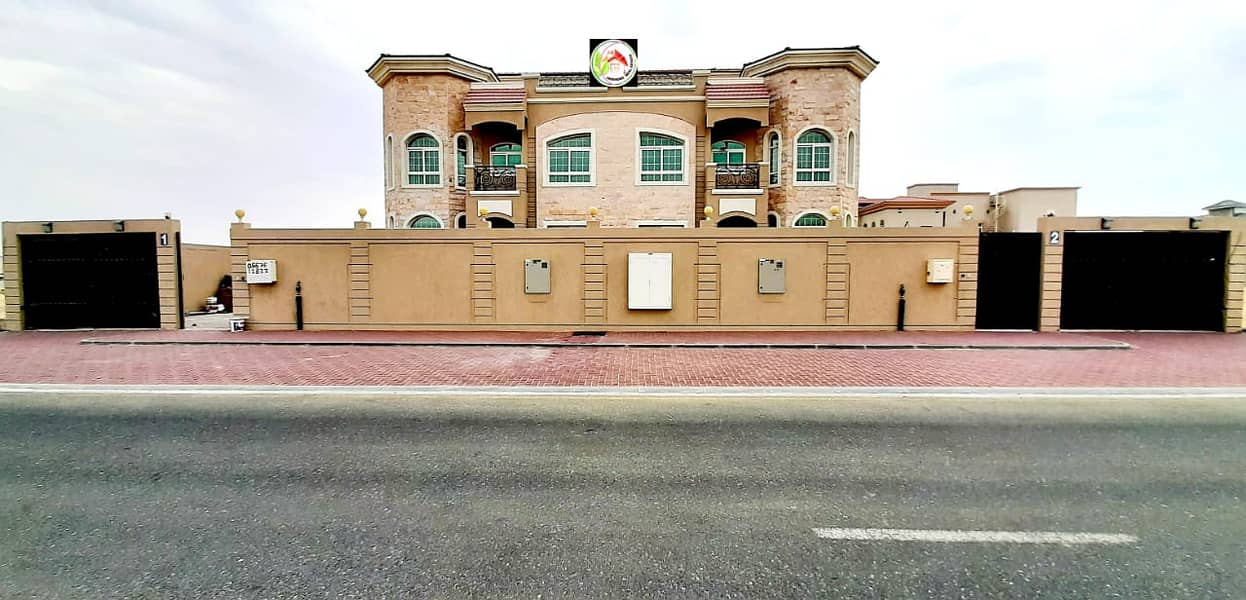 For sale two adjacent villas at a snapshot price, personal finishing, one stone face entirely, the best European decorations and designs, American central air conditioning, a very privileged location, a main qar street