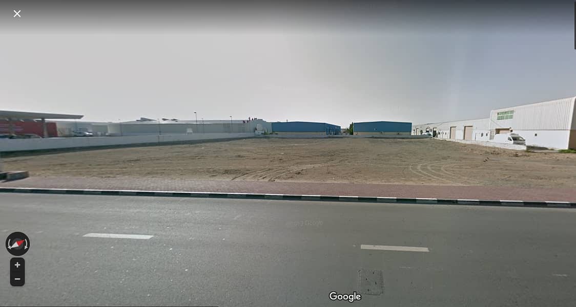 أرض بمنطقة الصناعية 13 الشارقة بموقع متميز جدا علي طريق الشيخ محمد بن زايد مباشر