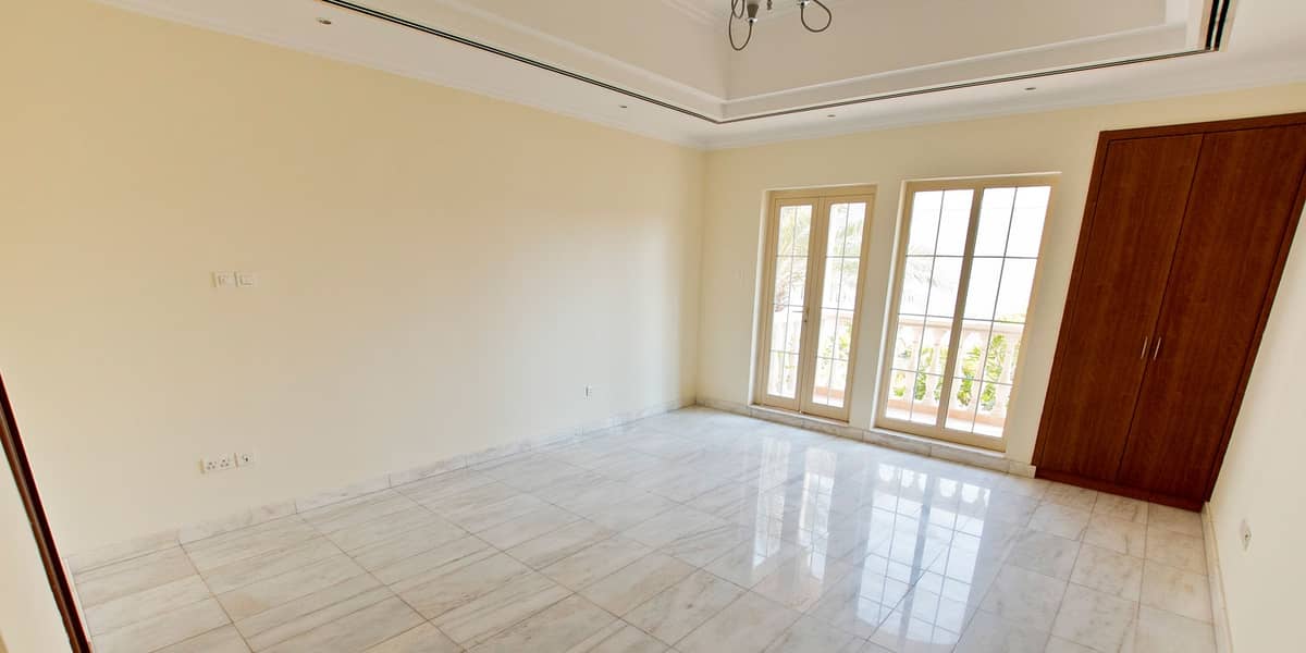 12 Secure warm double story family attached villa with 4 Bedrooms and 1 maid's room in Al Garhoud ideal for a big family