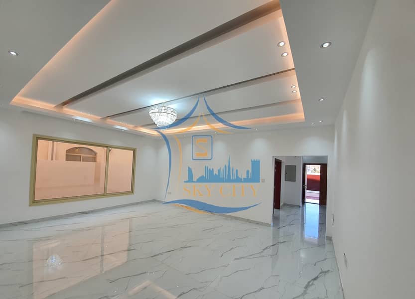 Villa for sale in front of a mosque, less than a minute on Sheikh Mohammed bin Zayed Road, less than 20 minutes away from Dubai International Airport