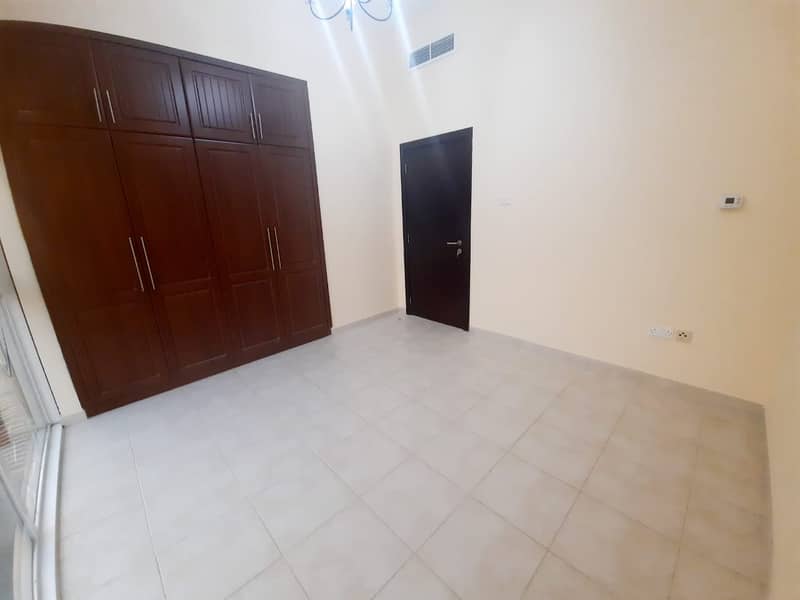WELL MAINTAINED HIGH QUALITY LARGE 4 BED ROOM CORNER VILLA WITH COMMUNITY POOL AND GYM I COMMUNITY VIEW I PVT YARD I CLOSED KITCHEN I ALL EN-SUITE BED ROOMS I STORE I LAUNDRY I ATTACHED WARDROBE I CLOSE TO MOSQUE AND SUPERMARKET FOR JUST AED 100,000/- PA