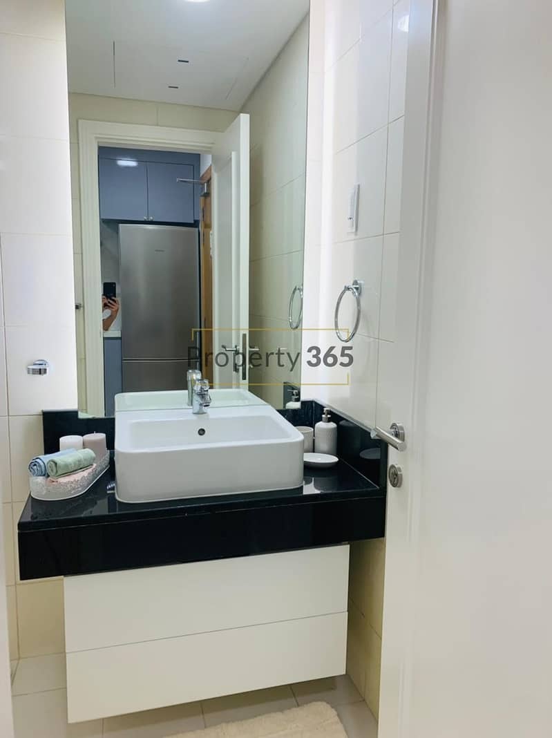 10 FULLY FURNISHED STUDIO IN CAPITAL BAY. 6-12 CHEQUES.