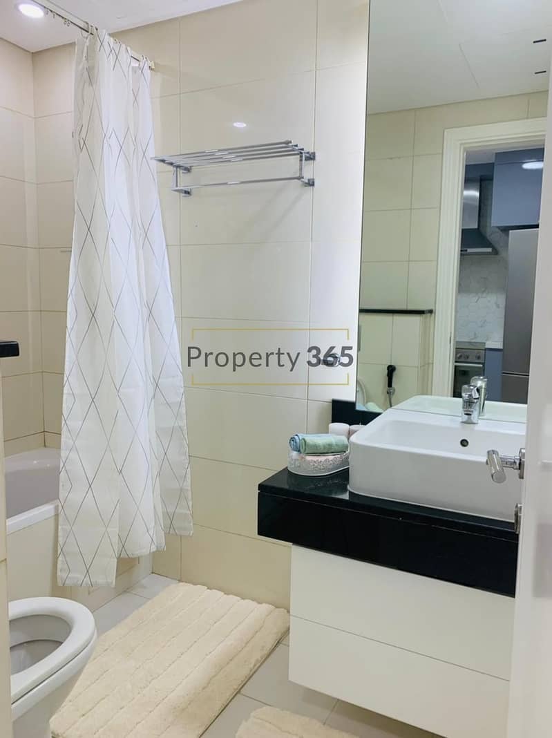 12 FULLY FURNISHED STUDIO IN CAPITAL BAY. 6-12 CHEQUES.