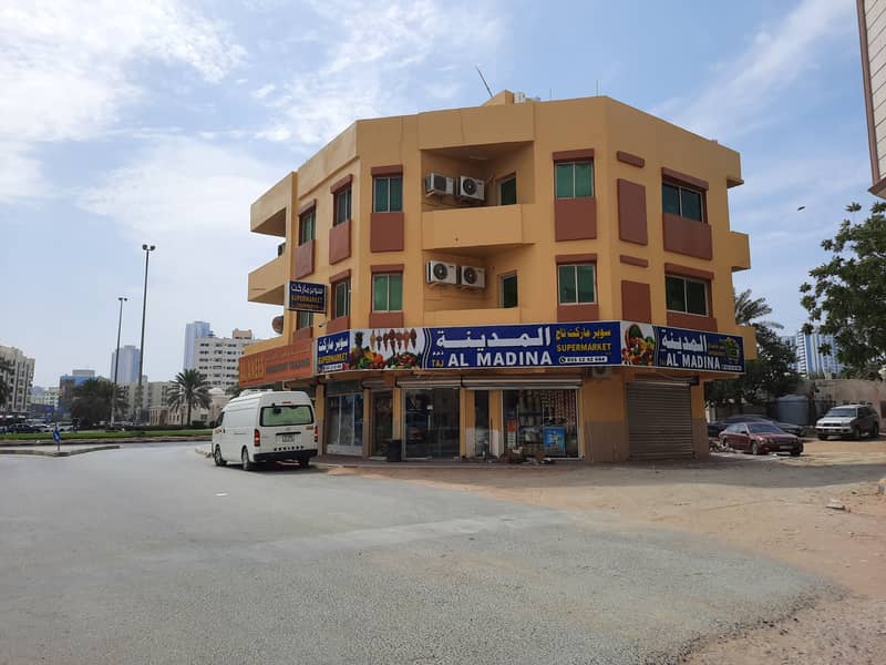 Building for sale in Al Bustan, residential, commercial, area of 2000 feet, corner 3 streets