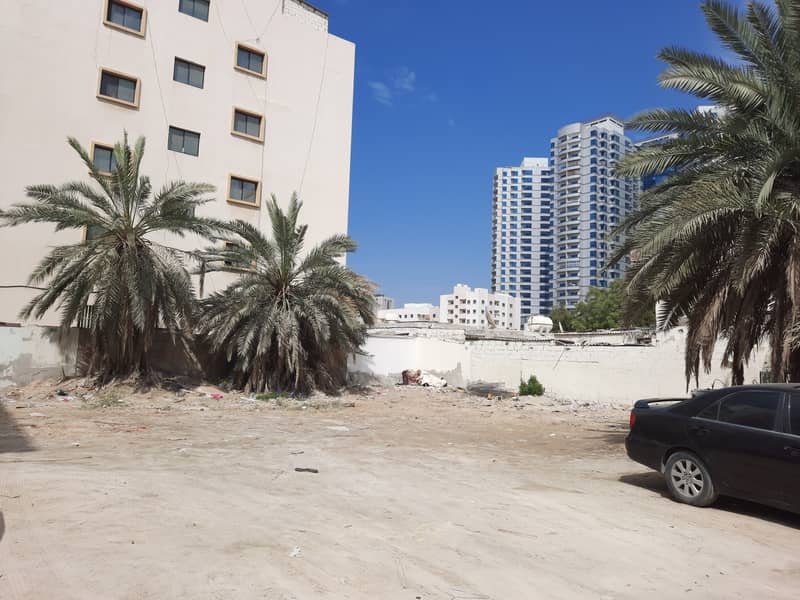 In Rashidiya2, behind Falcon Towers, land for sale, very excellent location, freehold