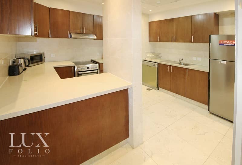 12 Furnished | Spacious 1 Bed | Partial Marina View