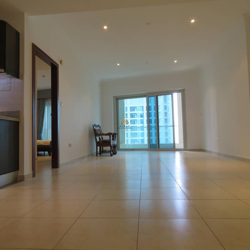 14 Huge!! newly revamped one bedroom located in Marina Heights on high floor with partial sea view.