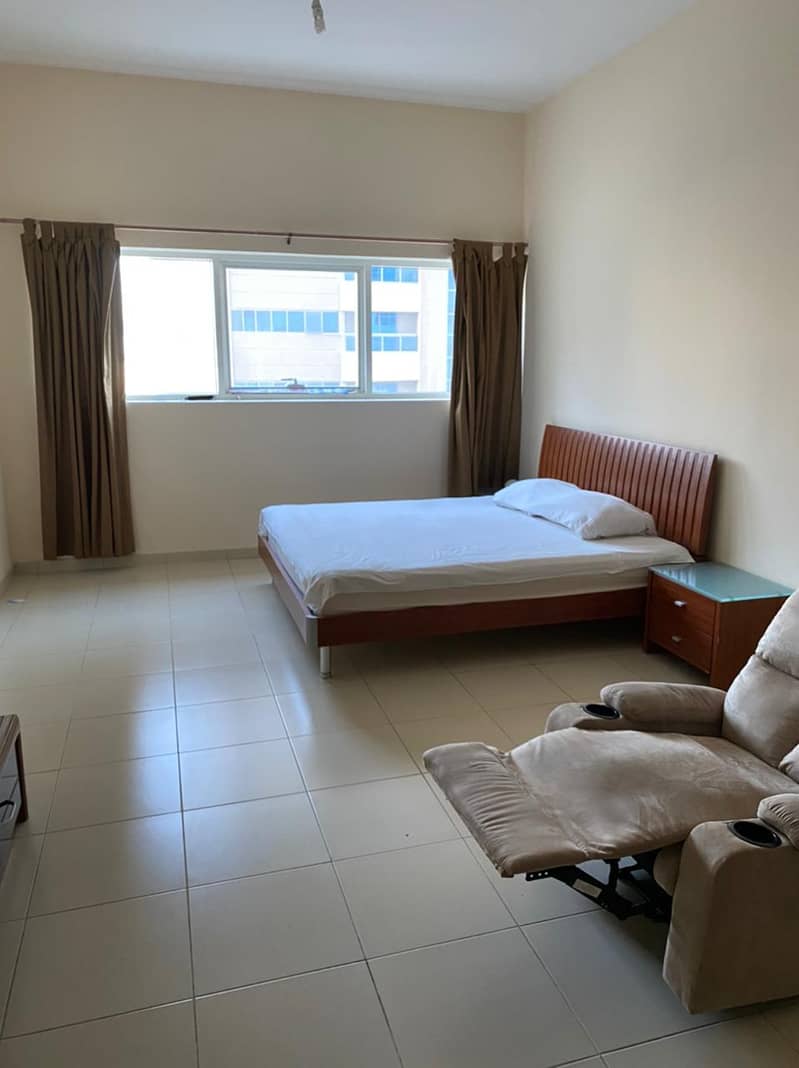 studio furnished for rent with parking in Ajman one tower