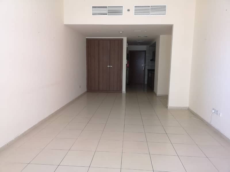 studio partial sea view for rent in Ajman one tower with parking