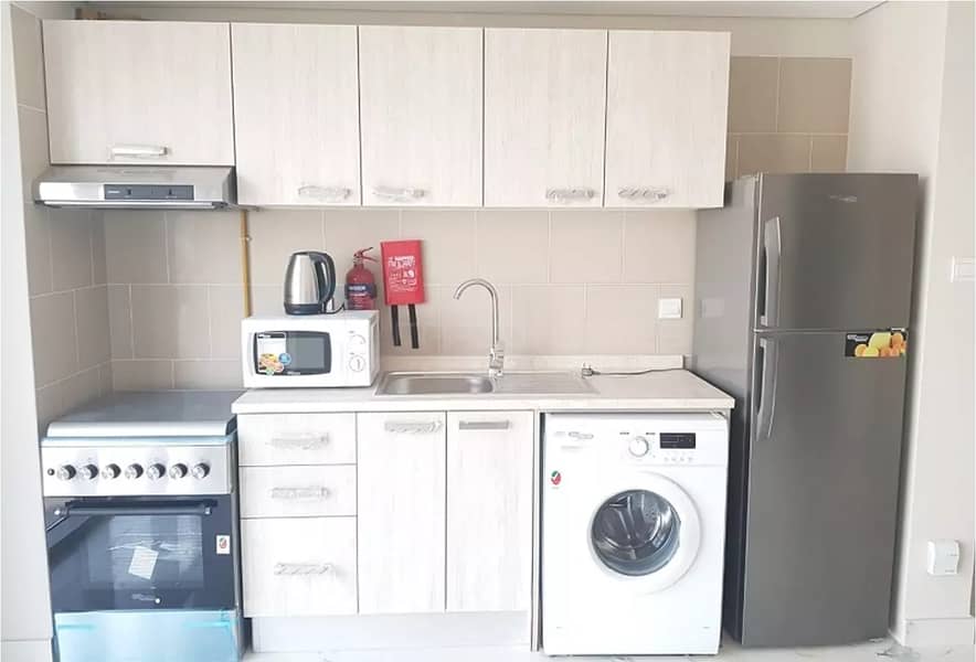 4 Studio with Kitchen Appliances @ AED 24K (12 chqs)