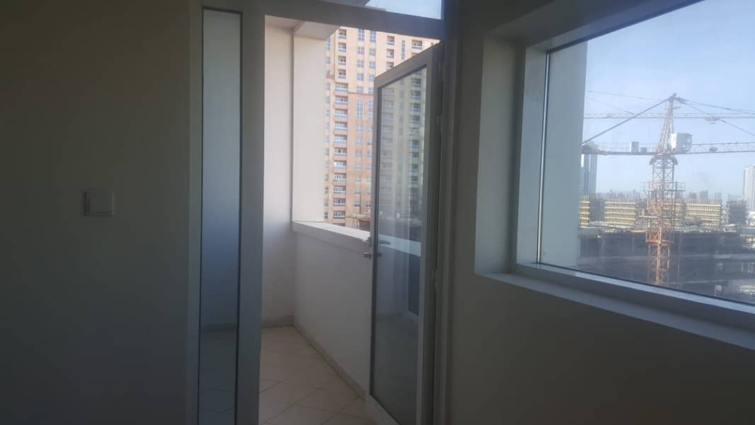For annual rent in Ajman Towers, an apartment of two rooms and a hall, a large area, at a very special price