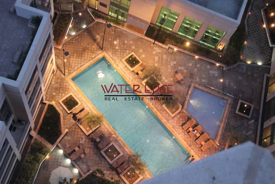 1BR with Balcony in Burj Views with Pool view