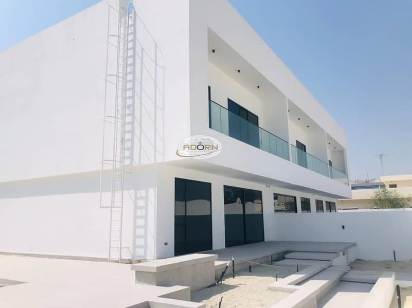 Brand new Modern  4 bedroom villa  with shared pool