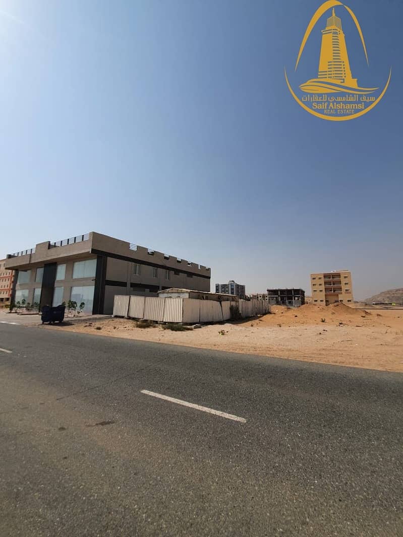 13 FOR SALE A COMMERCIAL LAND IN AL JURF AREA
