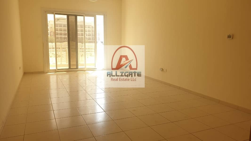 7 SPACIOUS 1 BED - ROOM APARTMENT WITH AN  EXCLUSIVE LAYOUT AND  ROAD VIEW IN EMIRATES GARDEN