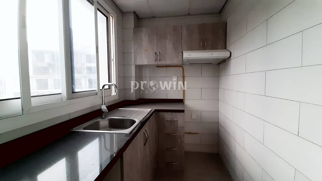 CLOSED KITCHEN |1  MONTH FREE RENT |PRIME LOCATION| BALCONY |POOL VIEW|BRAND NEW BUILDING !!
