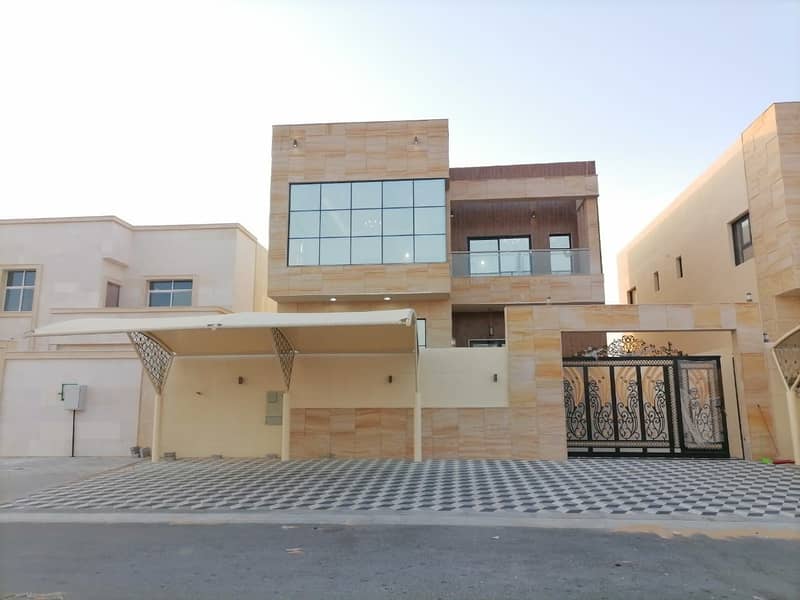 Villa for sale Ajman, Al Zahia area, close to Mohammed bin Zayed Street, modern architectural design - personal finishing with high quality building m