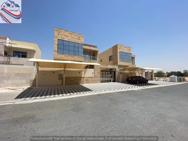 Villa for sale Ajman, Al Zahia area, close to Mohammed bin Zayed Street, modern architectural design - personal finishing with high quality building
