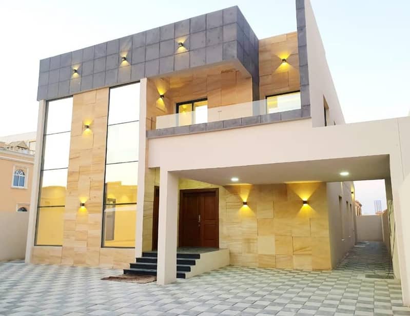 For sale, a modern villa, one of the most luxurious villas in Ajman, close to the mosque and the asphalt street, with a design that resembles the desi