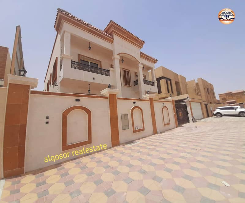 For sale villa in Ajman, Al Mowaihat area, Arabic design, facing stone, freehold ownership for all nationalities without down payment