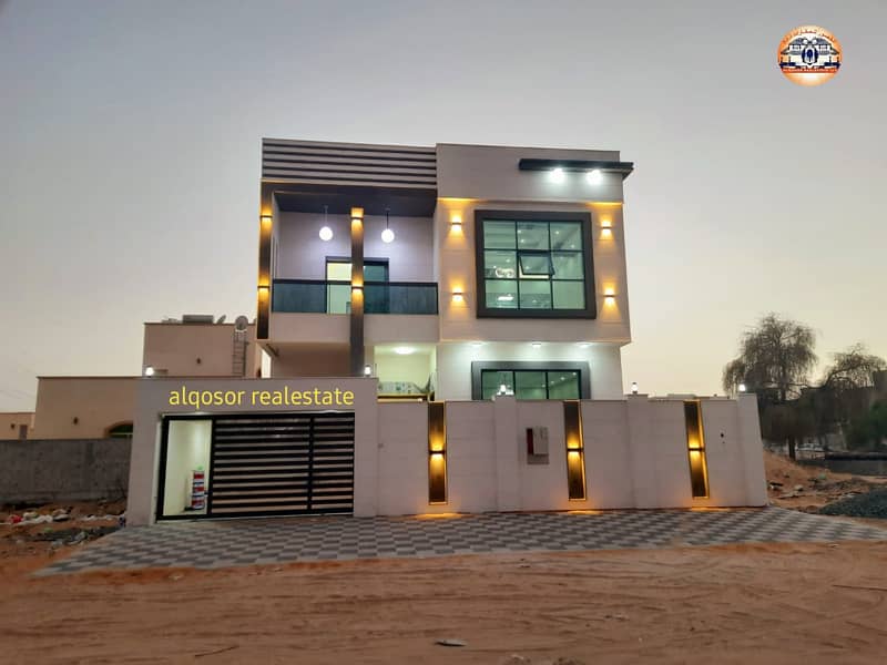 The location of the villa in Ajman, the Jasmine area, two floors, a stone face on a straight street, a modern design