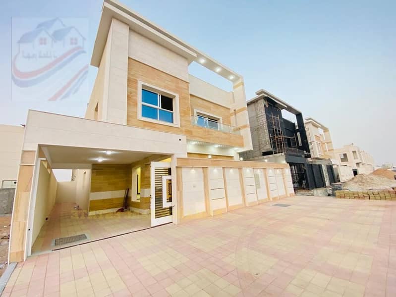 The location of the villa in Ajman, the Jasmine area, two floors, a stone face, a design of various finishes, on a straight street