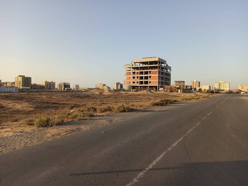 Excellent opportunity for investment, commercial land in Al-Jarf industrial area on. 2 - second plot from Jeddah Street - free of all nationalities - Ajman