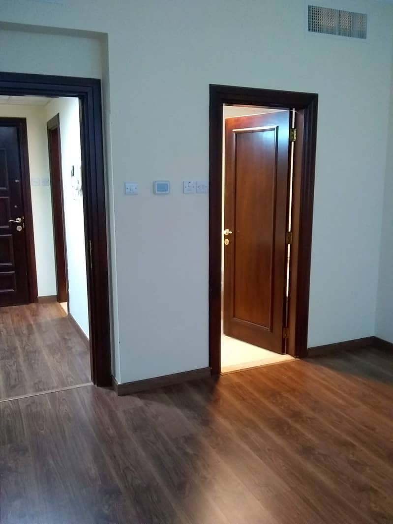 Luxury semi furnished 1bhk with basement parking central AC 36k