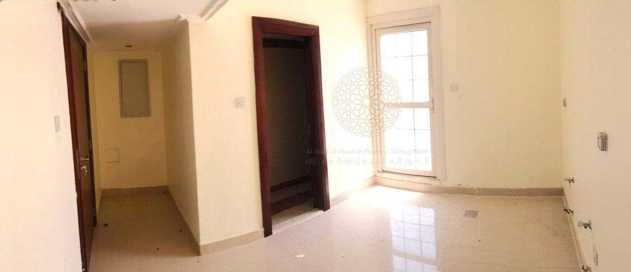 17 ATTRACTIVE 5 BEDROOM SEMI INDEPENDENT VILLA WITH BIG FRONT YARD AND DRIVER ROOM FOR RENT IN KHALIFA CITY A