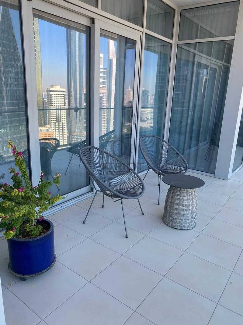 16 stunning 3 BR in Burj Daman with a view of DIFC and a full sea view.