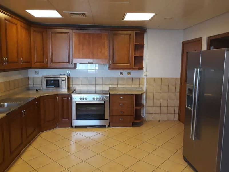 9 Spacious-Fully equipped Kitchen-2 Parking+Maids Room