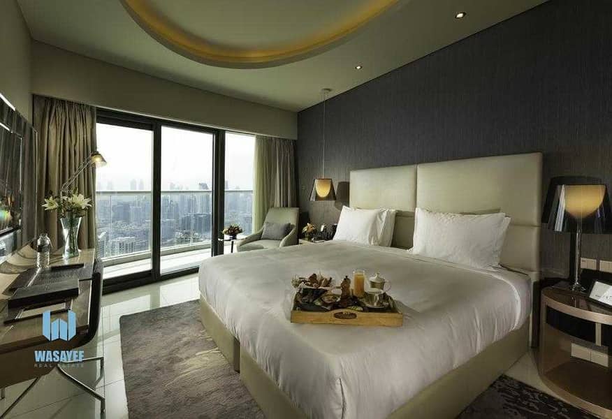 9 Boutique apartment in the iconic PARAMOUNT tower Dubai. .