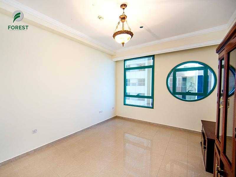 12 Partly Furnished | Spacious 2BR Apt | Mid Floor