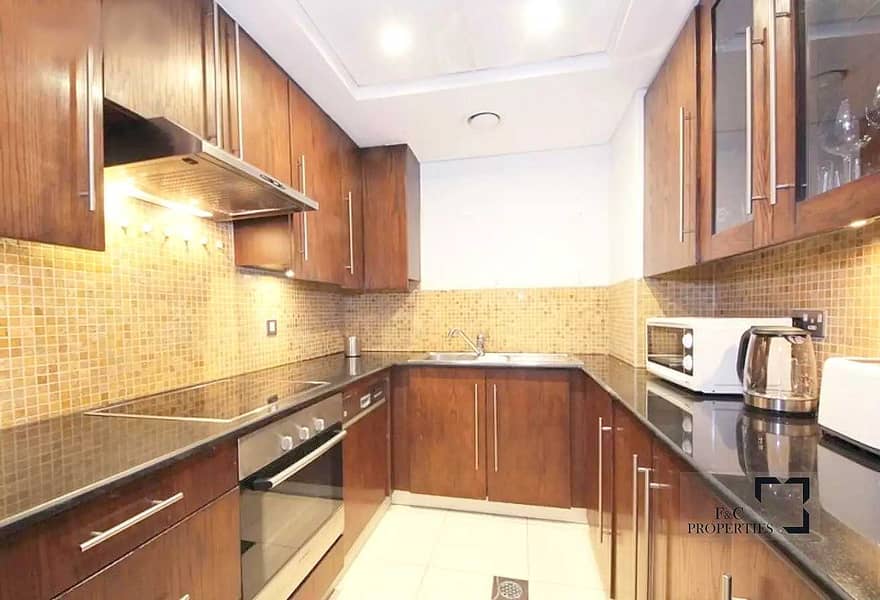 6 Spacious 1BR | High Floor | Fitted Kitchen