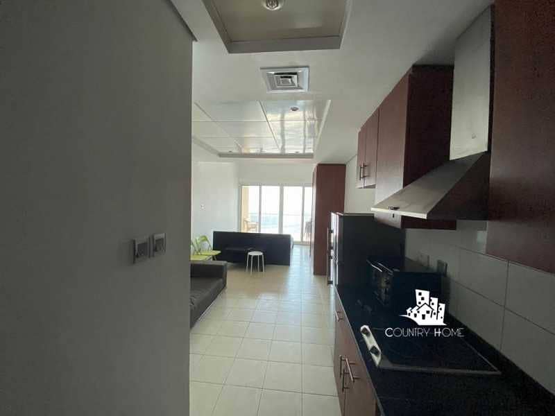 4 Studio with Parking | Partial Lake | Mid Floor