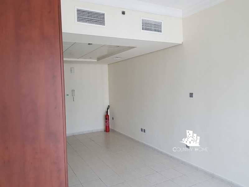 5 Studio with Parking | Partial Lake | Mid Floor