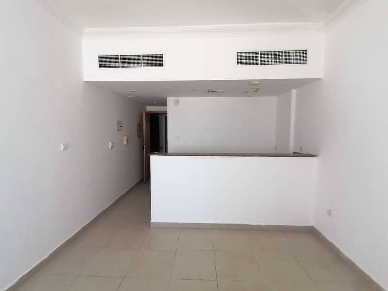 Good offer 2 Months free Spacious very nice Studio apartment American style kitchen with Wordrobes close to school zone in muwaileh sharjah just 16k